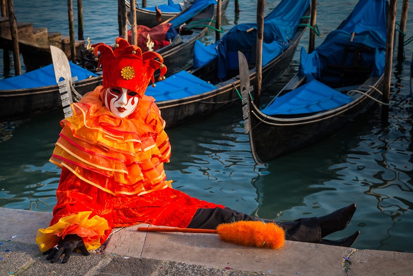 Costumed Person in front of Gondolas